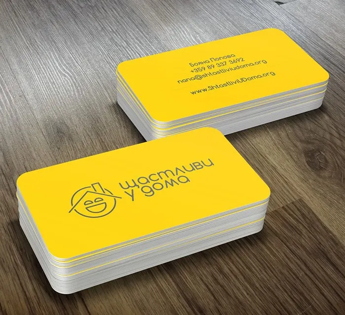 Yellow business cards with rounded corners
