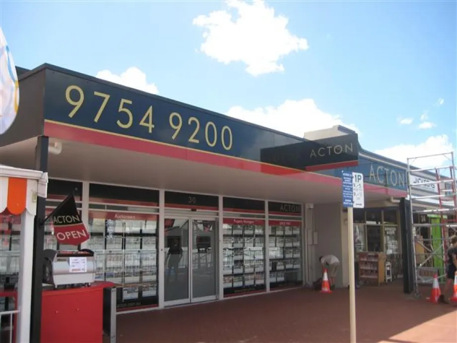 Acton real estate shopfront with the phone number on the fascia