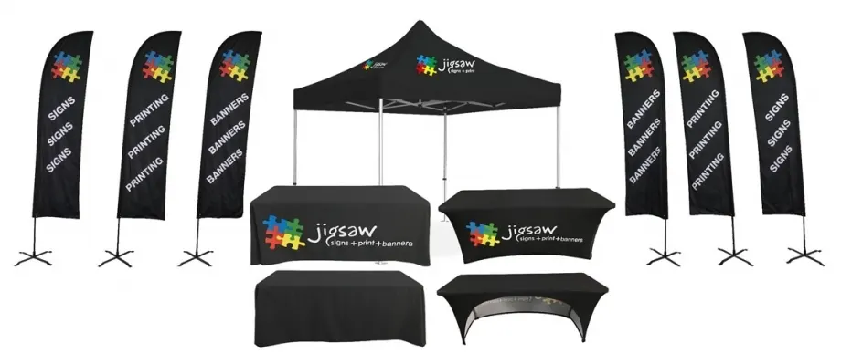 Branded marquee, feather flags and table covers
