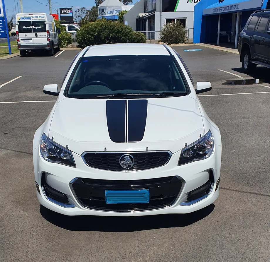 Holden Commodore with black bonnet stripes