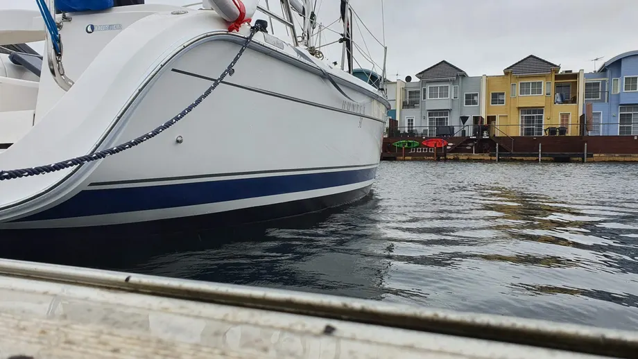 Boat hull with blue stripe graphics