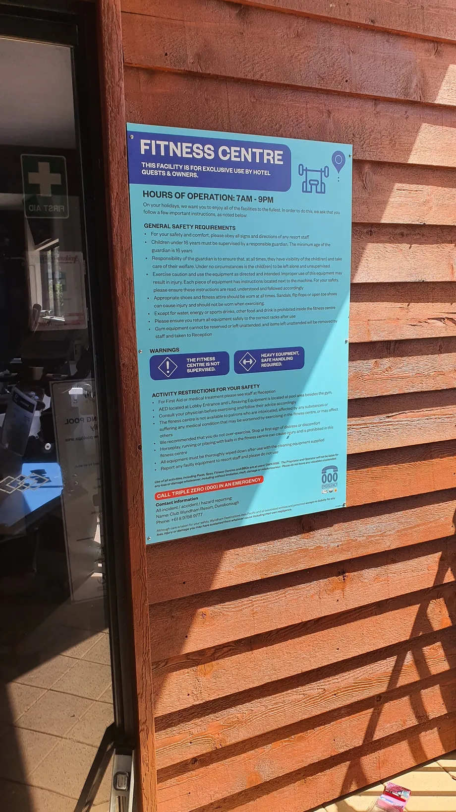 Club Wyndham fitness centre information sign on a timber wall