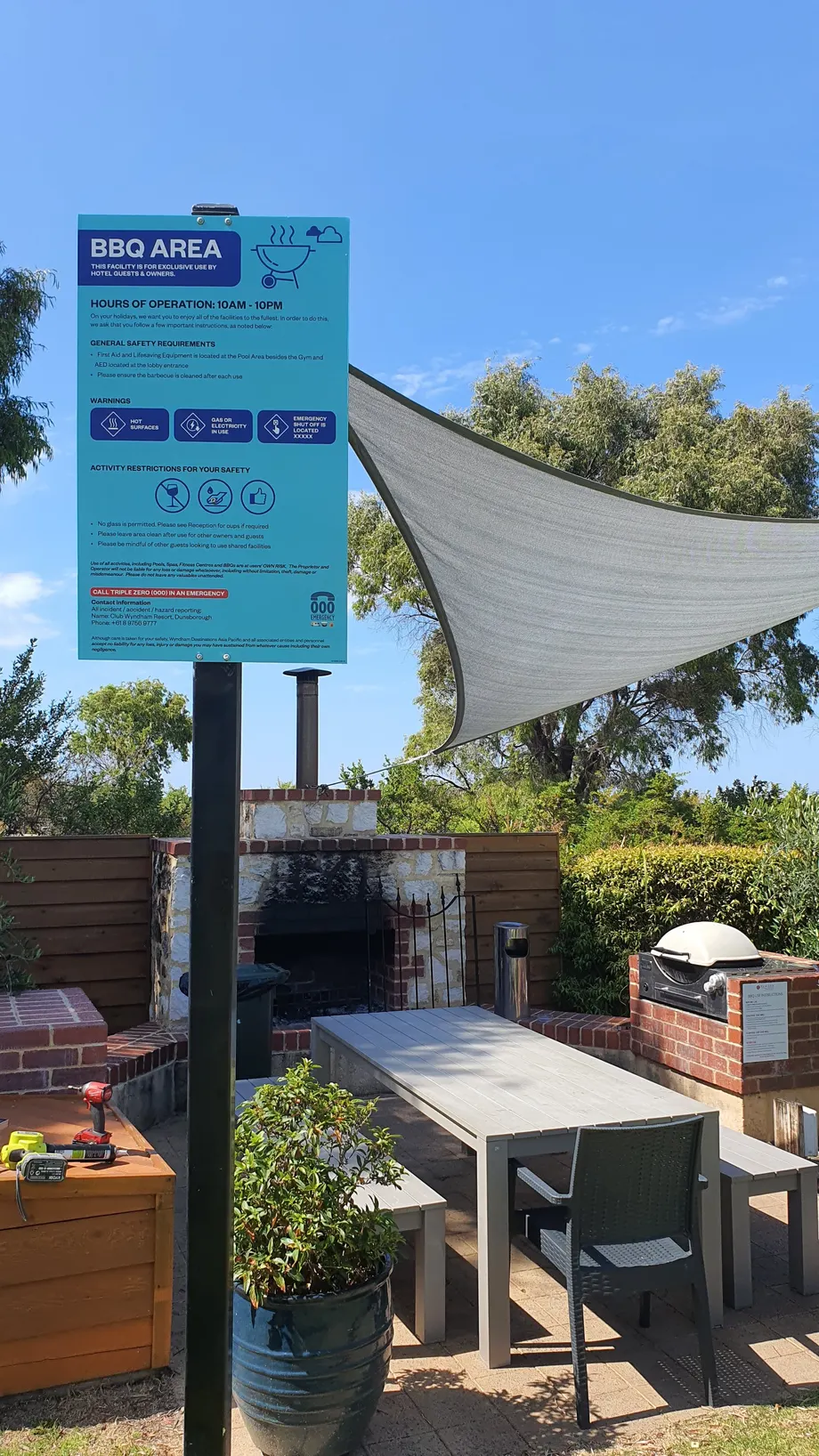 Club Wyndham BBQ area sign on a post beside the outdoor kitchen