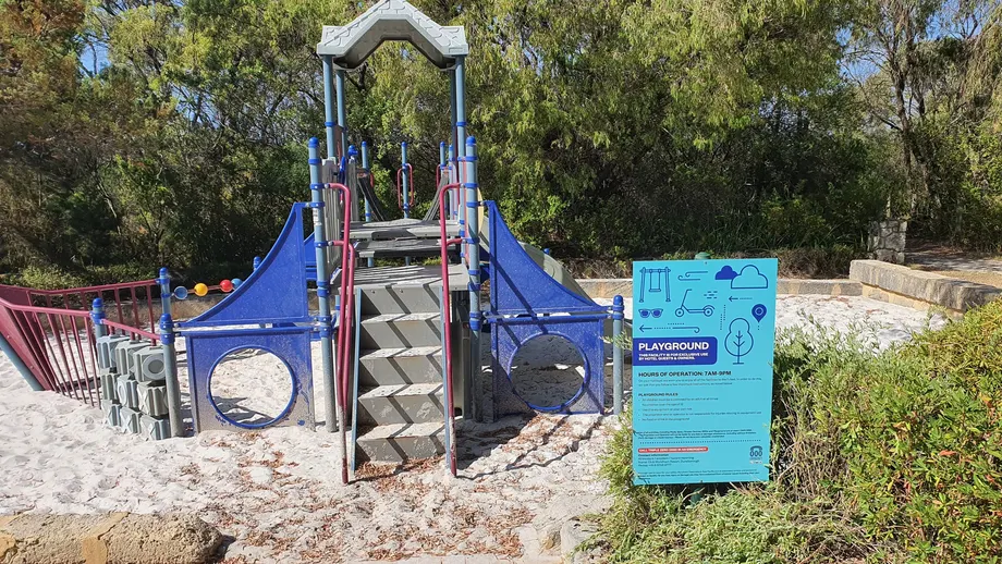 Club Wyndham playground sign beside the play equipment