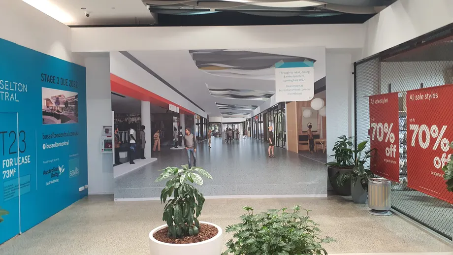 Busselton Central shopping centre walkway with hoarding graphics