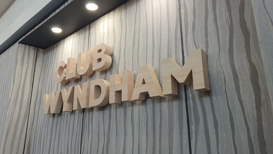 Club Wyndham timber-look dimensional letters on a feature wall