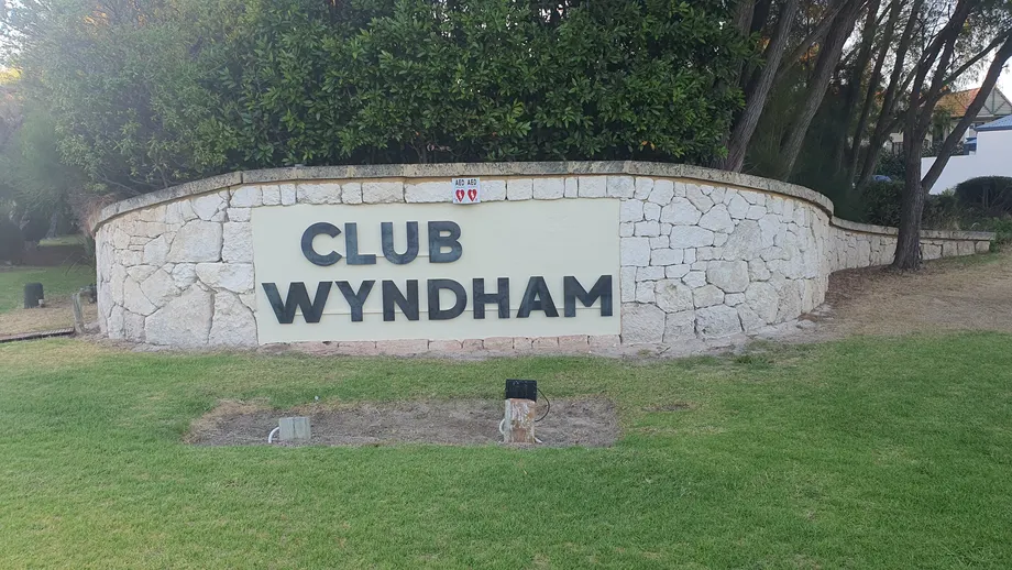 Club Wyndham letters on a limestone entry wall