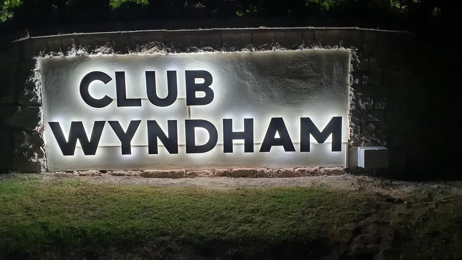 Club Wyndham backlit entry sign at night