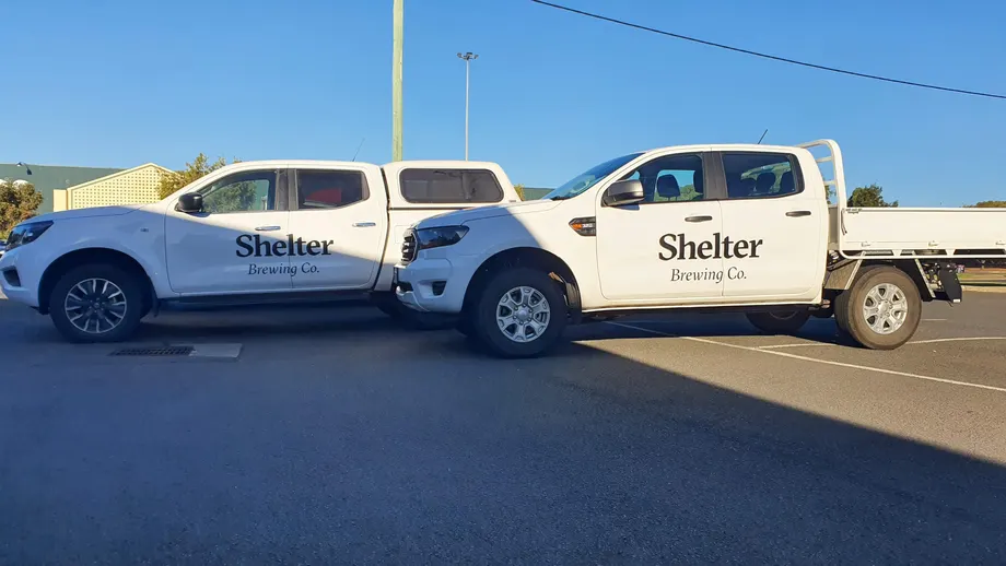 Shelter Brewing Co utes with door graphics