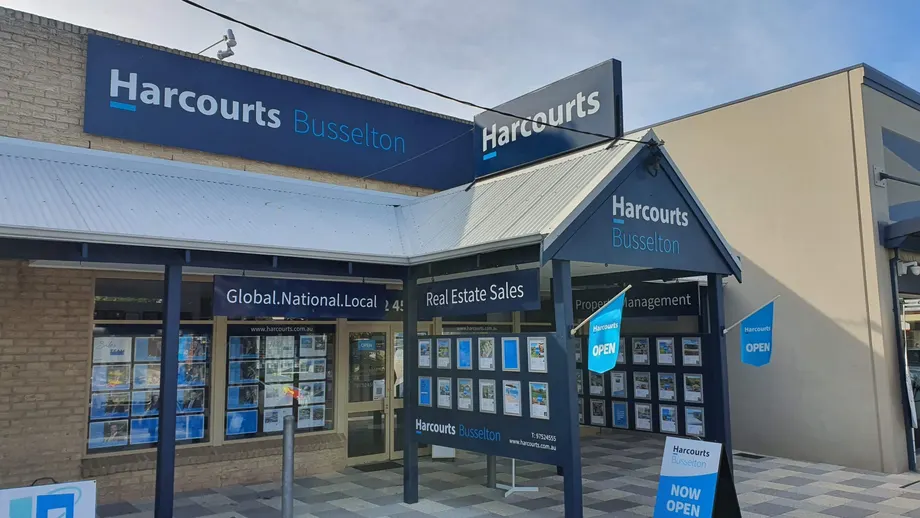 Harcourts real estate office fascia and window signage