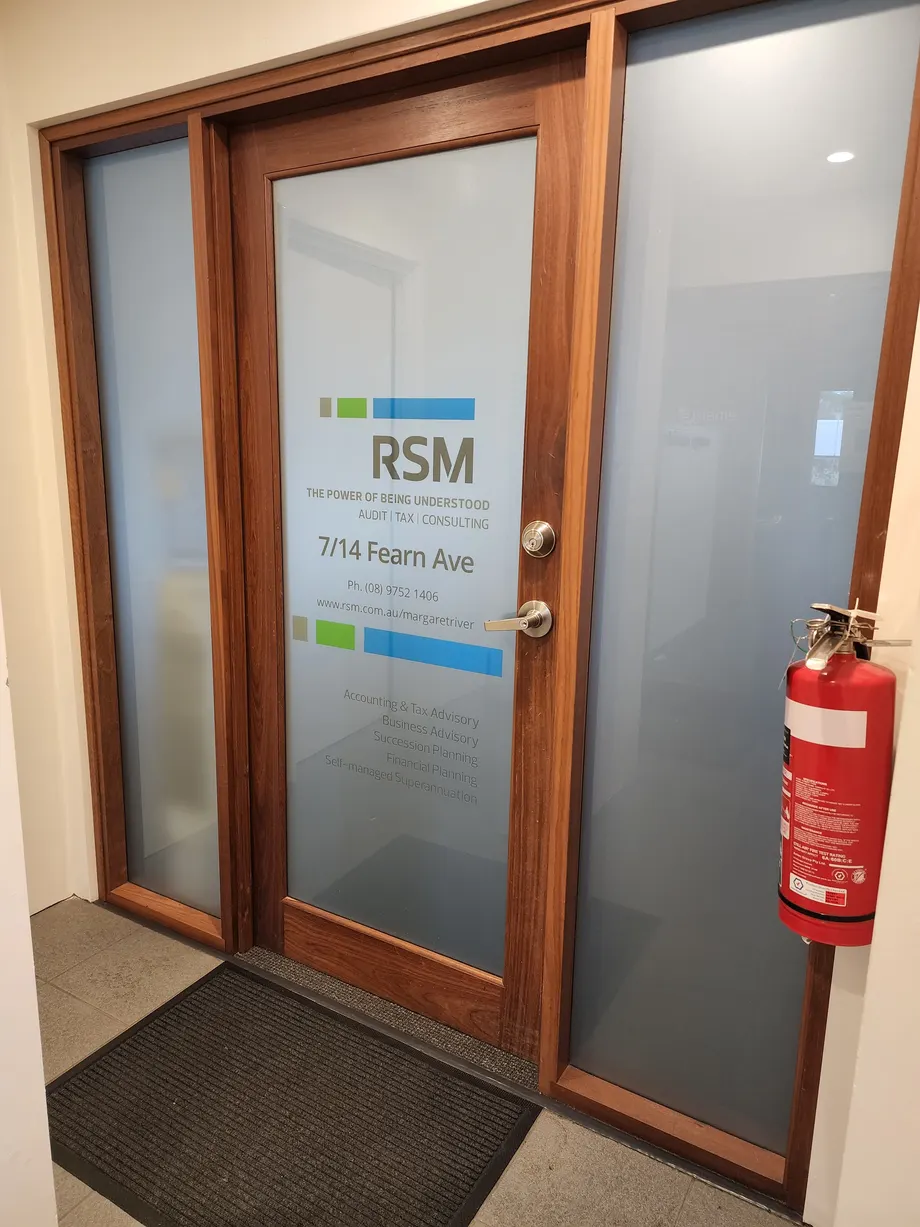 RSM office door with frosted window graphics