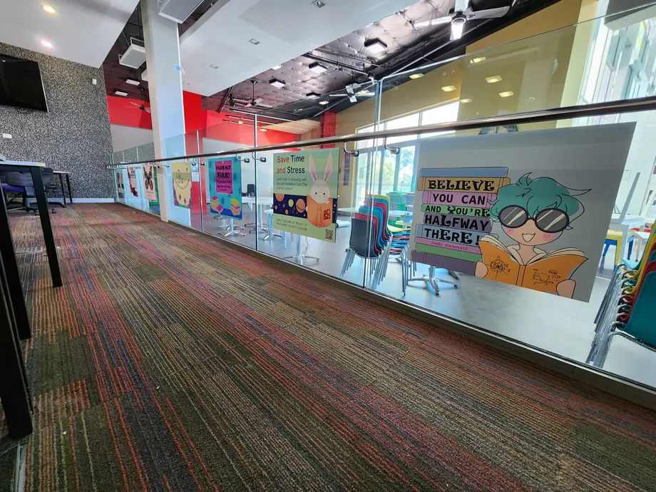 Office mezzanine with printed glass balustrade graphics