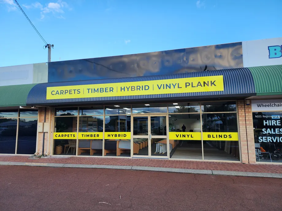 Trevors Carpets shopfront with new fascia and window signage